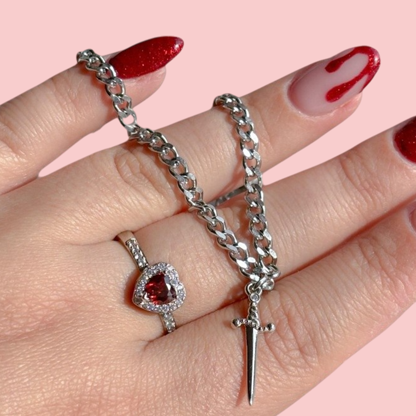 Set brățară și inel din argint „Inimă cu sabie”
